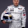 8890 Гонщик Мика Паули Хеккинен - был Чемпионом мира Формулы Один 1998 и 1999 годов.