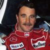 9021 Гонщик Хуан Мануэль Фанхио - водитель гоночного автомобиля из Аргентины.