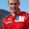 9337 Гонщик Михаэль Шумахер. Чемпион мира и широко расценен как один из самых великих водителей F1.
